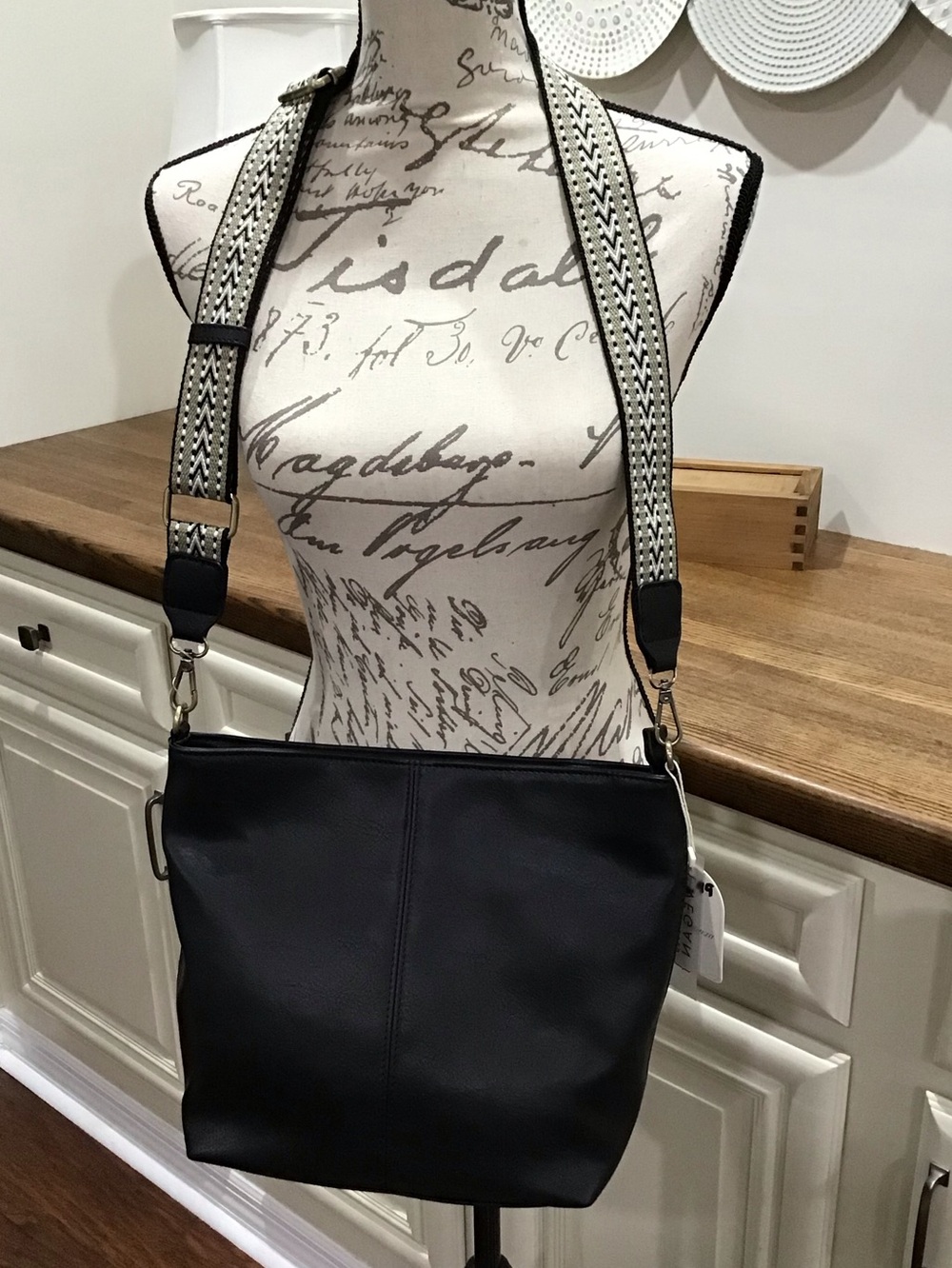 Black Crossbody Bag with Patterned Guitar Strap